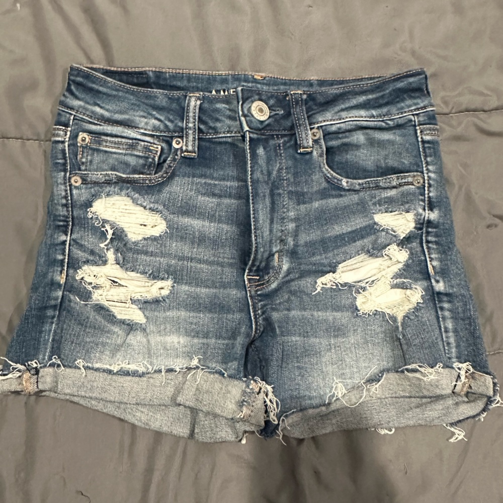 Distressed denim shorts